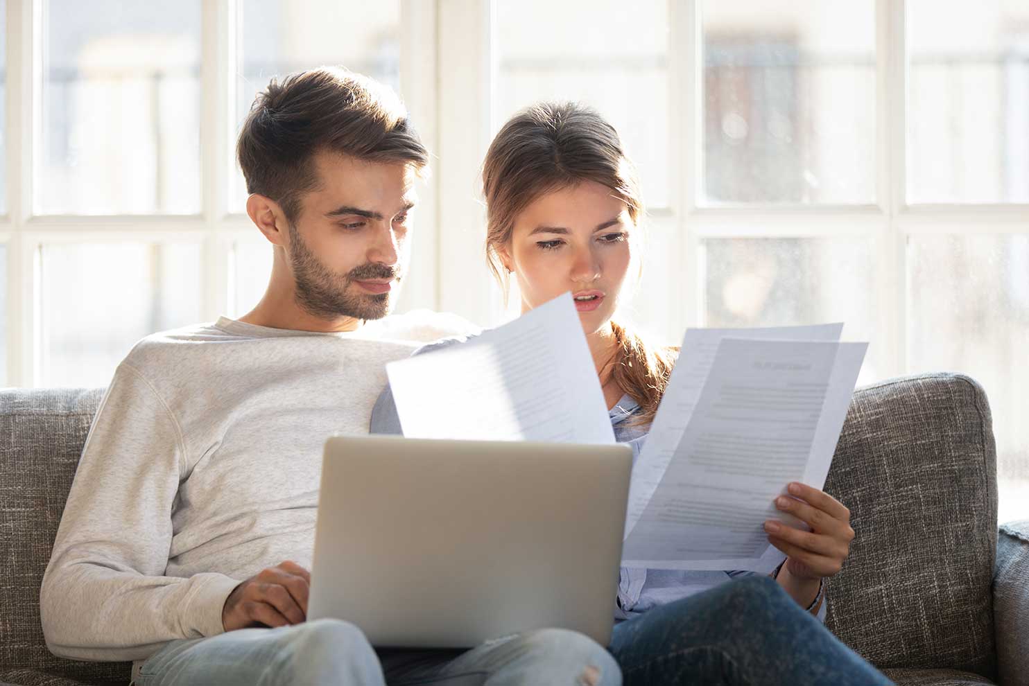 Couple looking over mortgage forms